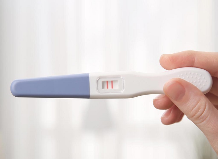 HOW LONG WILL AN OVULATION TEST STAY POSITIVE